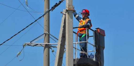 Employee working on a power grid