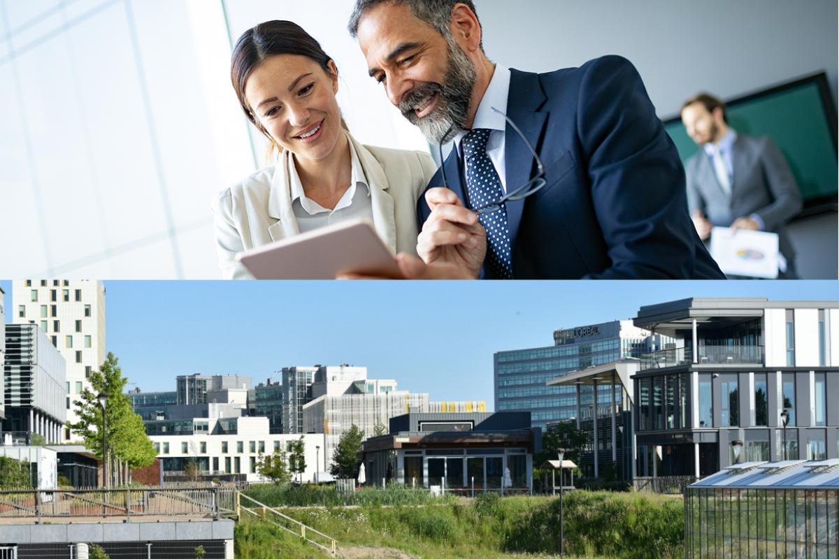 Employees working together and a modern office building in Amsterdam Airport City